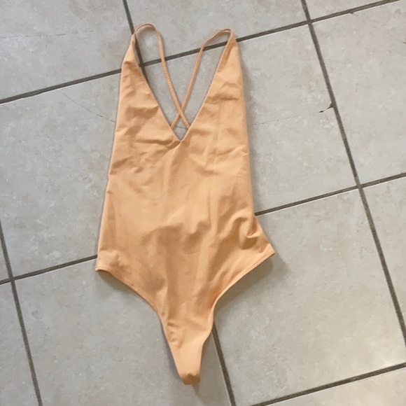 Babaton Other - Babaton bodysuit size Medium. Light orange